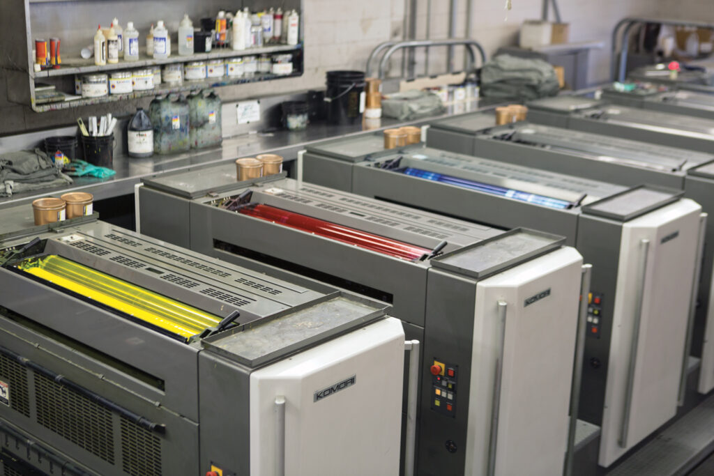 Komori Press showing the 4 colors of ink